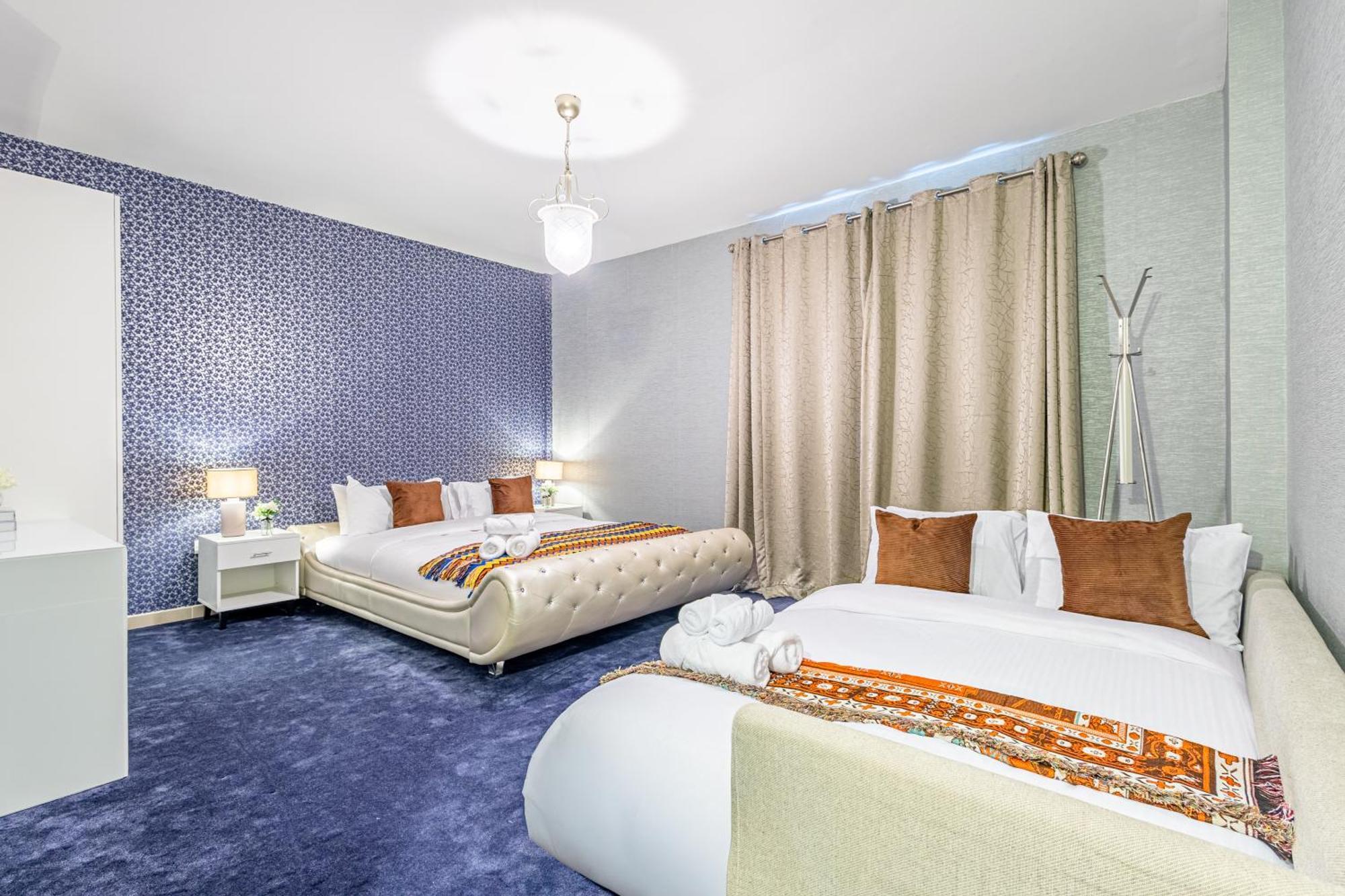Modern Oasis - Elegant Cave - Family Heaven - Designer's Paradise - 10 Min Away From Airport, Yas Island, Formula 1, Ferrari World, Seaworld, Warner Bros World Apartment *